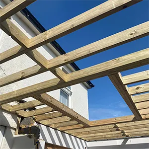 a wooden structure with a sky background